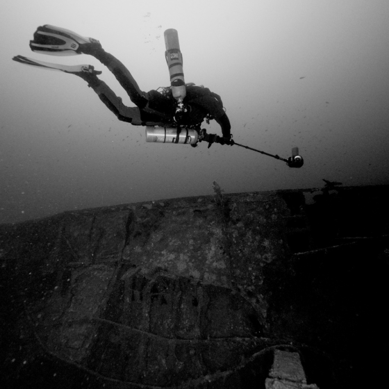 A UCHU diver using the Boxfish 360 to film an underwater heritage site