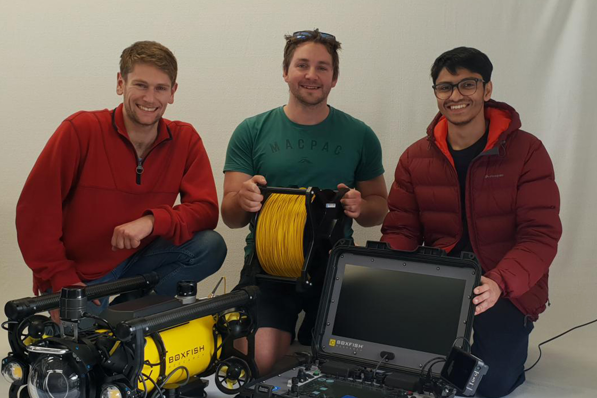 Jono (R&D), Chris (Production Engineer) and Pransh (R&D) with Boxfish drone