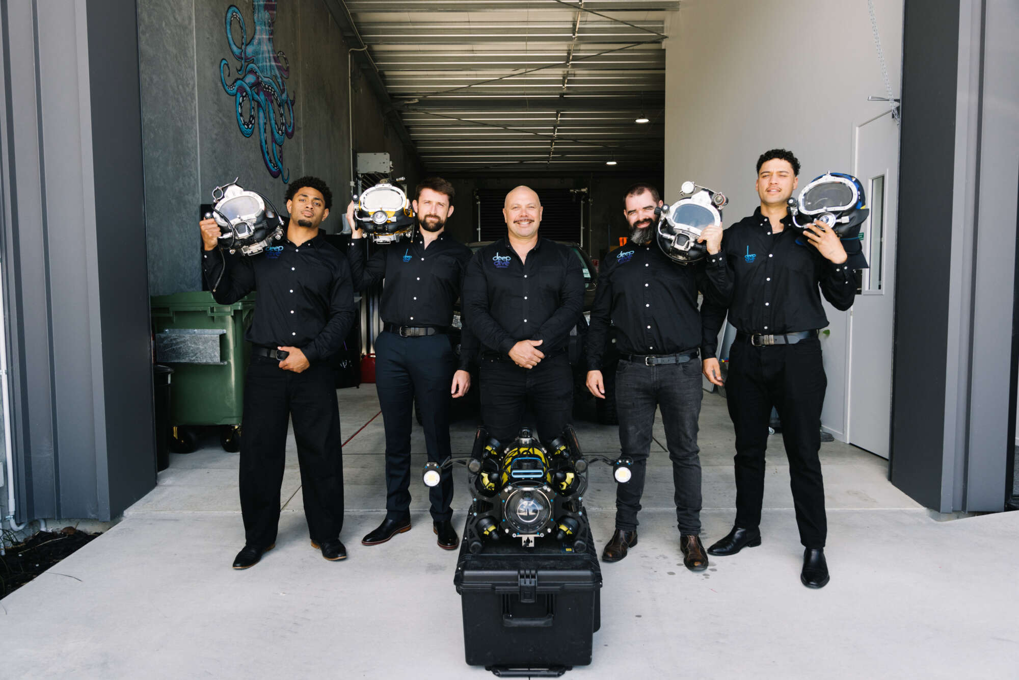 Deep Dive Division team with their gear and Boxfish ROV